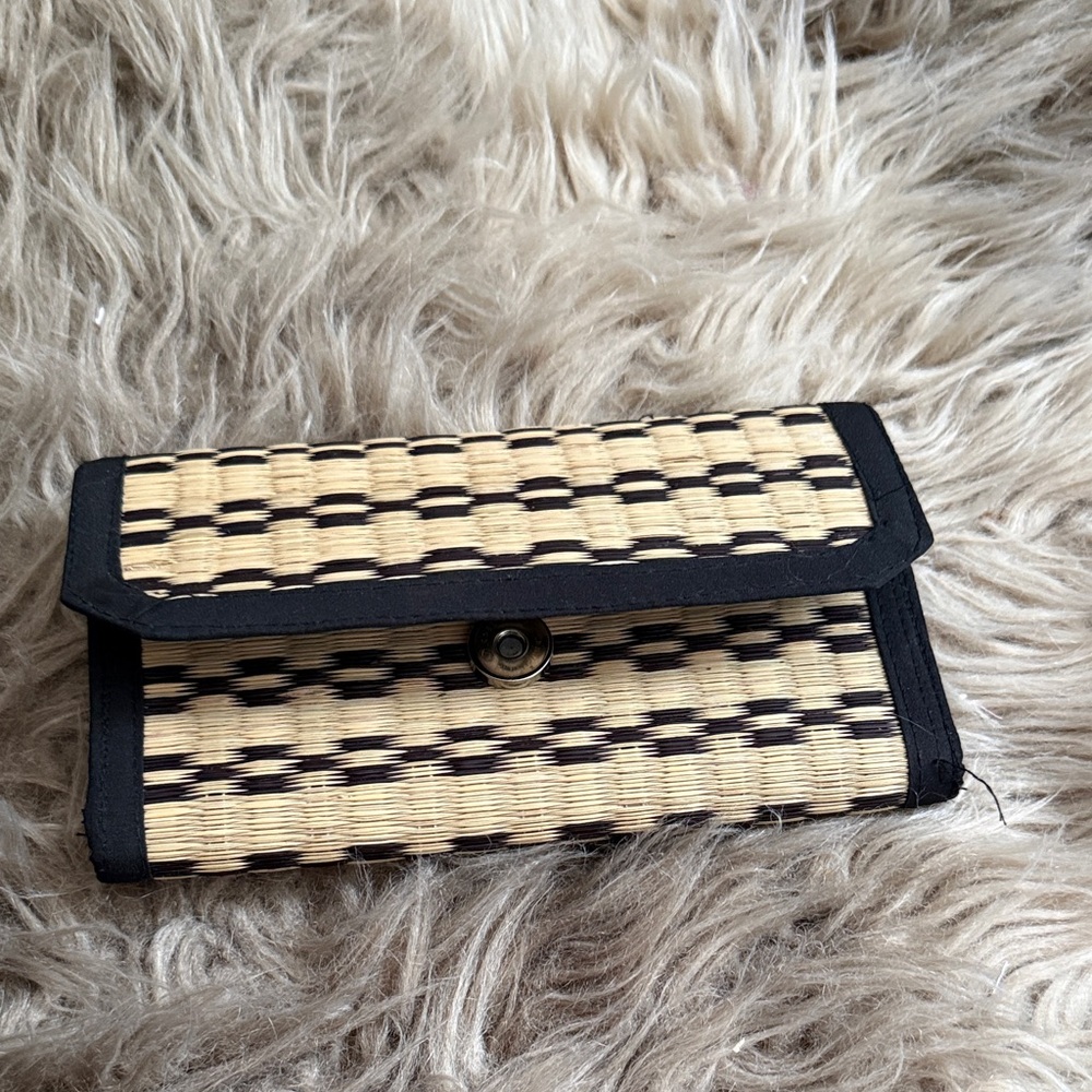 Elegant Black and Tan Woven Clutch
